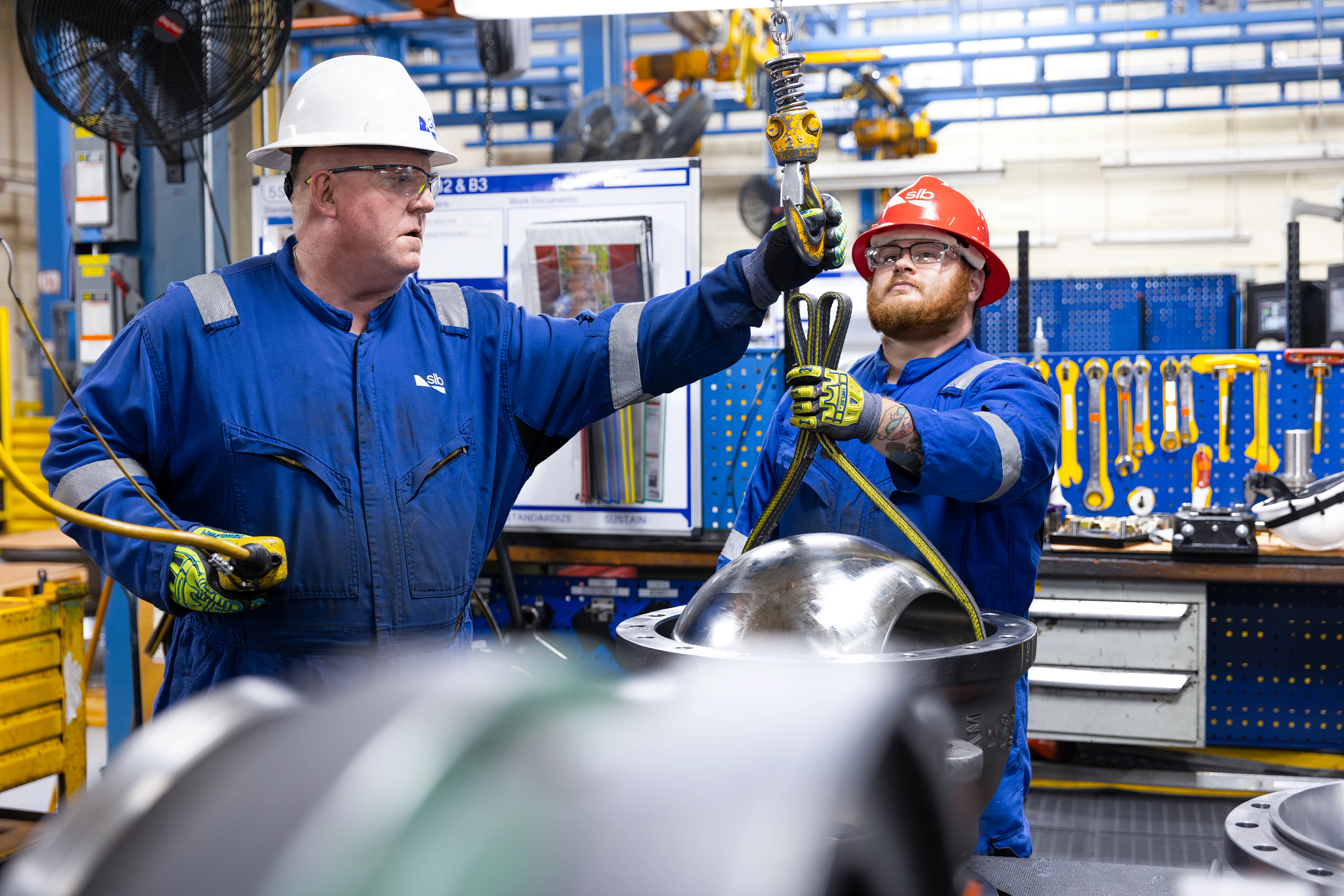 Technicians working on industrial valves